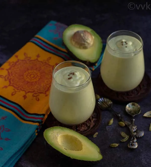 breakfast smoothie with avocado in two glass jars