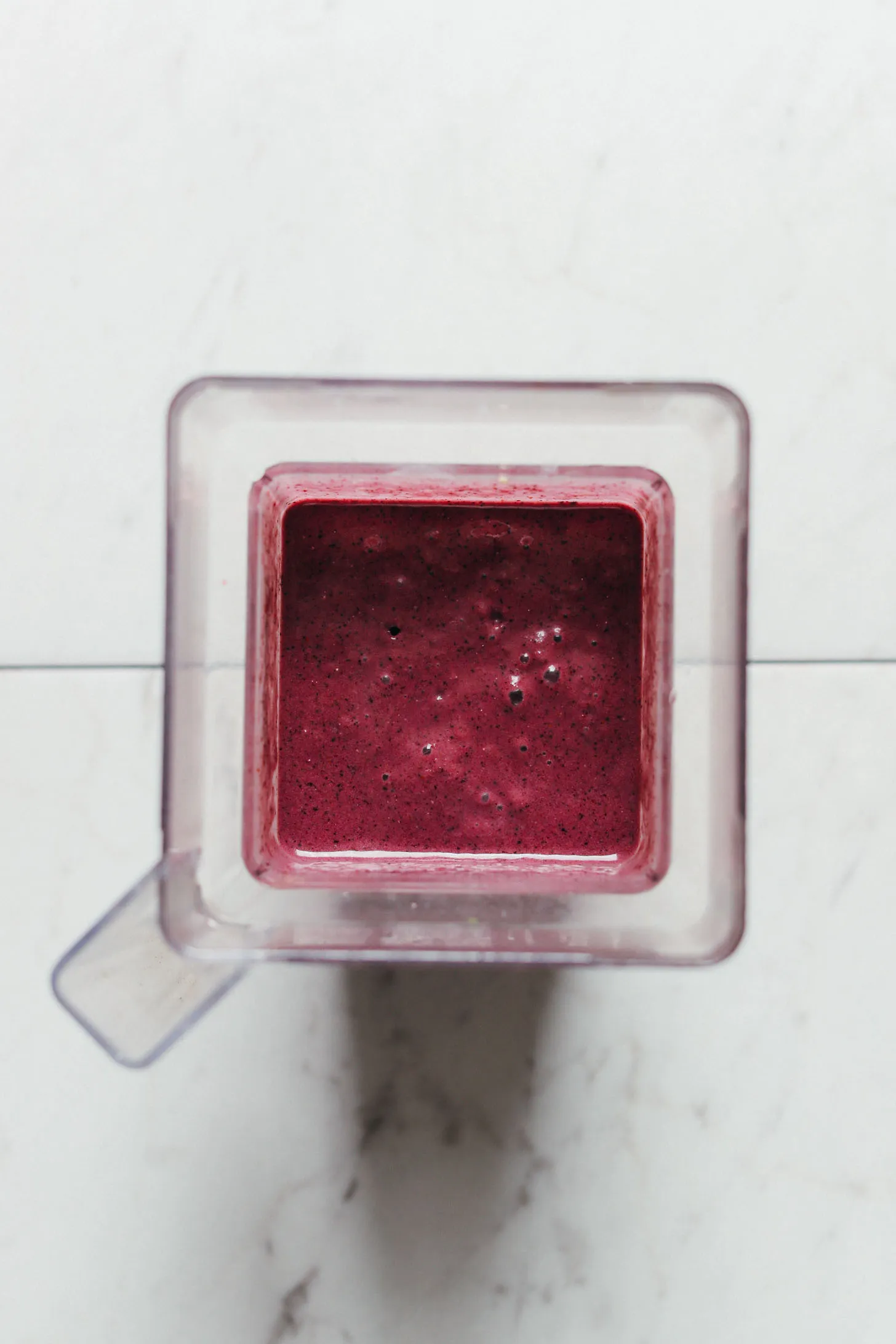 Top view of our beautiful and healthy Zucchini Berry Smoothie in the blender